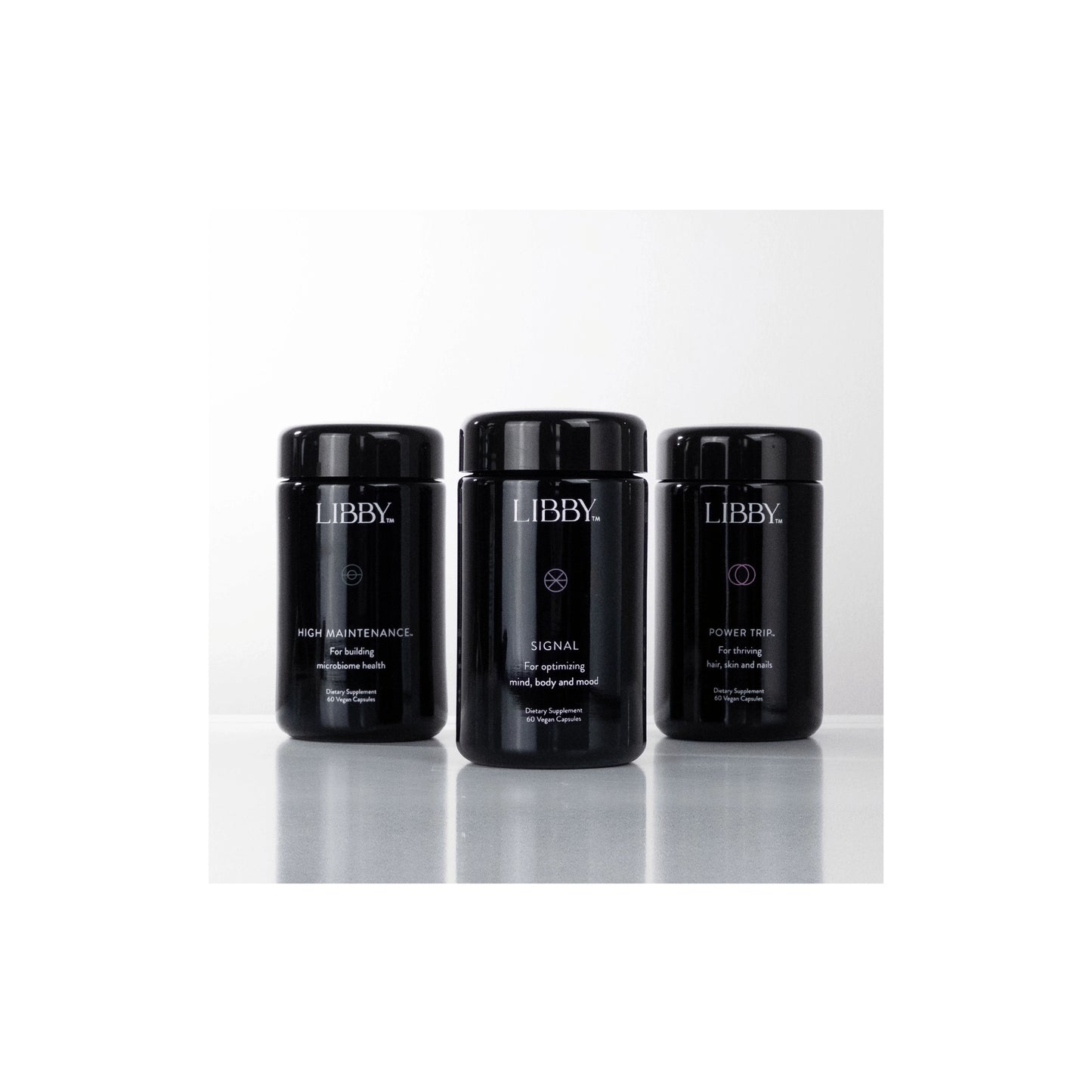 Group shot of The Libby System featuring Signal, Power Trip, and High Maintenance jars for complete female wellness support