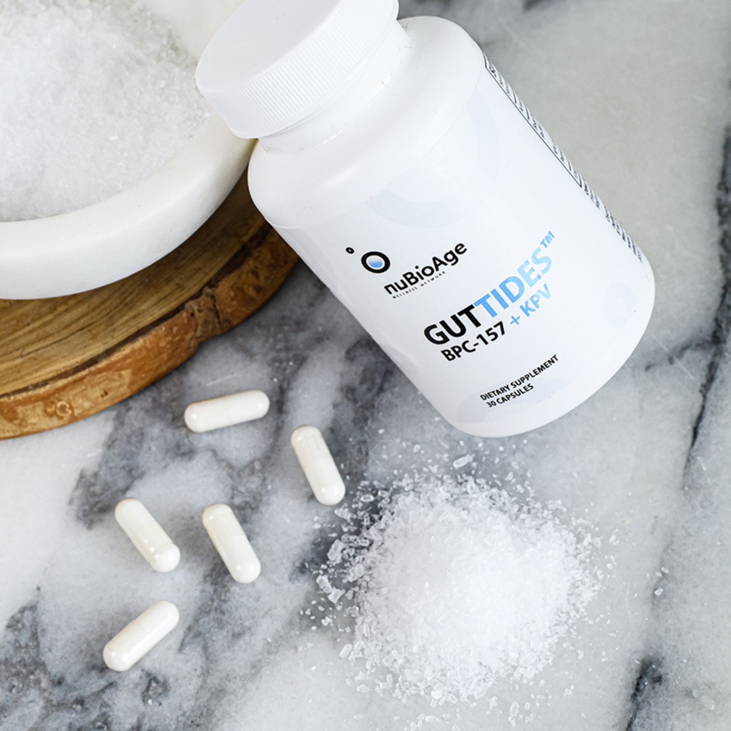 Another bottle of Guttides peptides supplement.