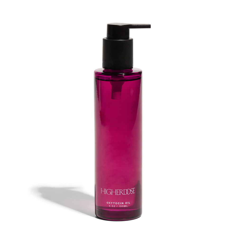 HigherDOSE Oxytocin Oil in a purple pump bottle for skin hydration and elasticity.