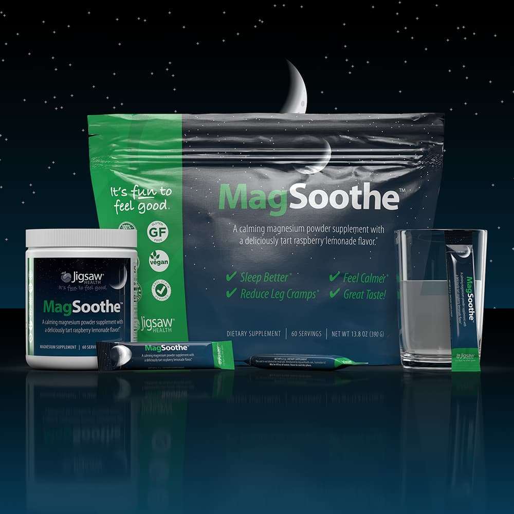 Jigsaw MagSoothe magnesium glycinate powder supplement with tart raspberry lemonade flavor for better sleep and muscle relaxation displayed with packaging and glass of water under night sky