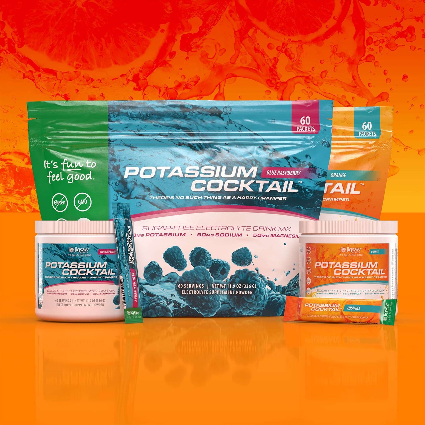 Jigsaw Potassium Cocktail sugar-free electrolyte powder packets and tubs in blue raspberry and orange flavors on orange background