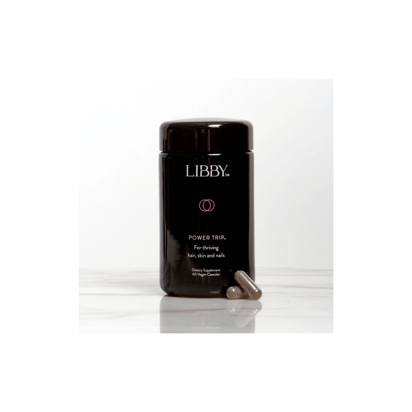 Front view of The Libby System Power Trip 60 capsules jar highlighting the specialized hair skin and nails nourishment formula