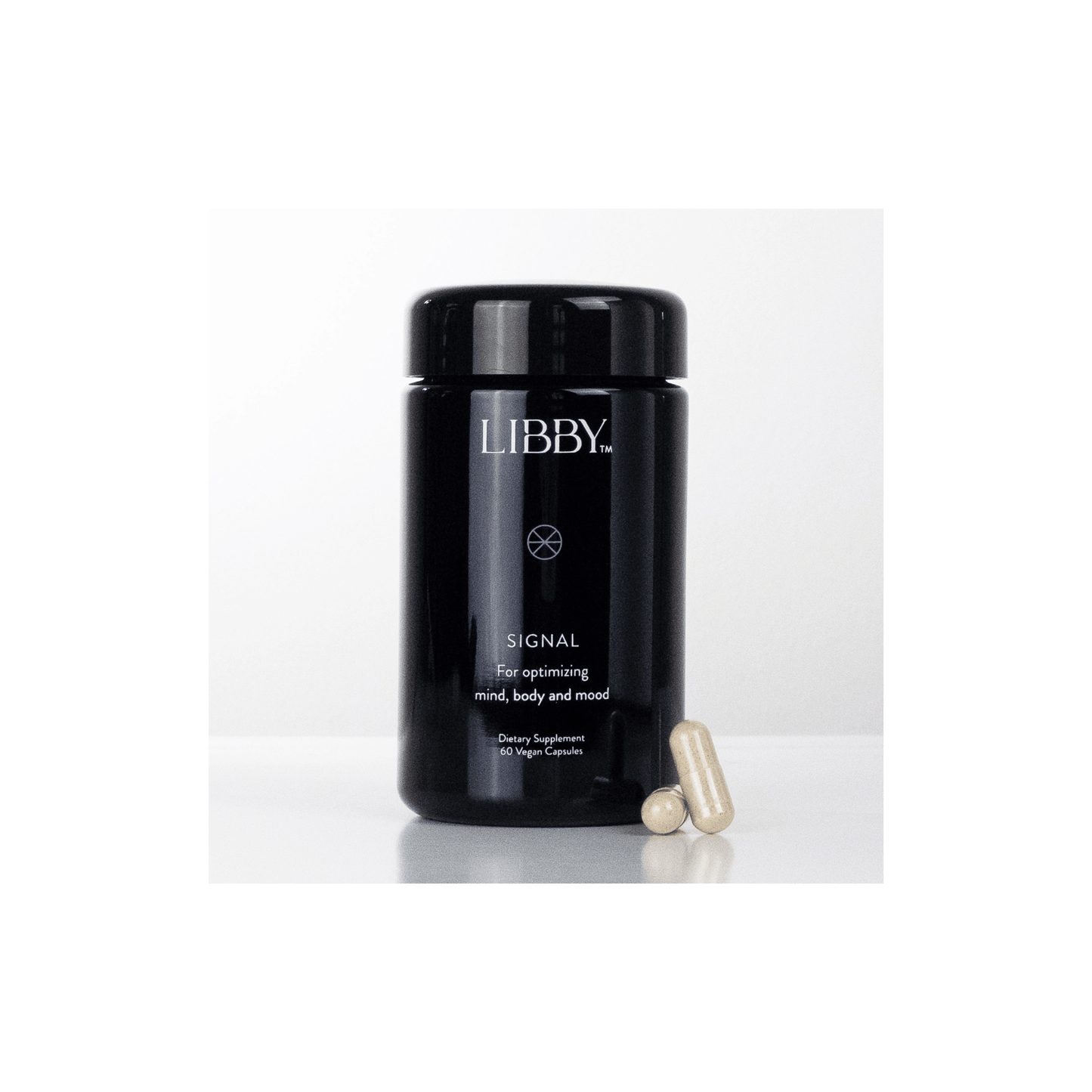 Front view of The Libby System Signal 60 capsules jar highlighting the patented daily wellness formula for mind body and mood