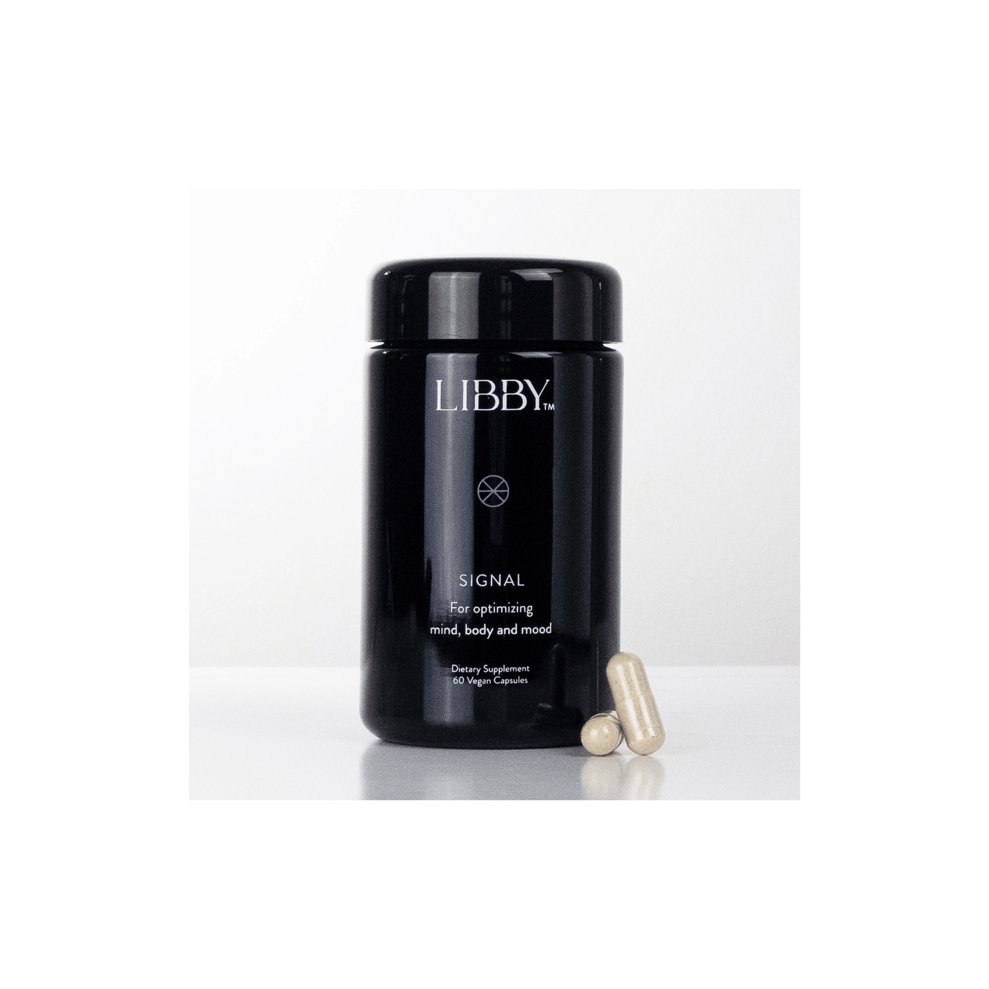 Front view of The Libby System Signal 60 capsules jar highlighting the patented daily wellness formula for mind body and mood