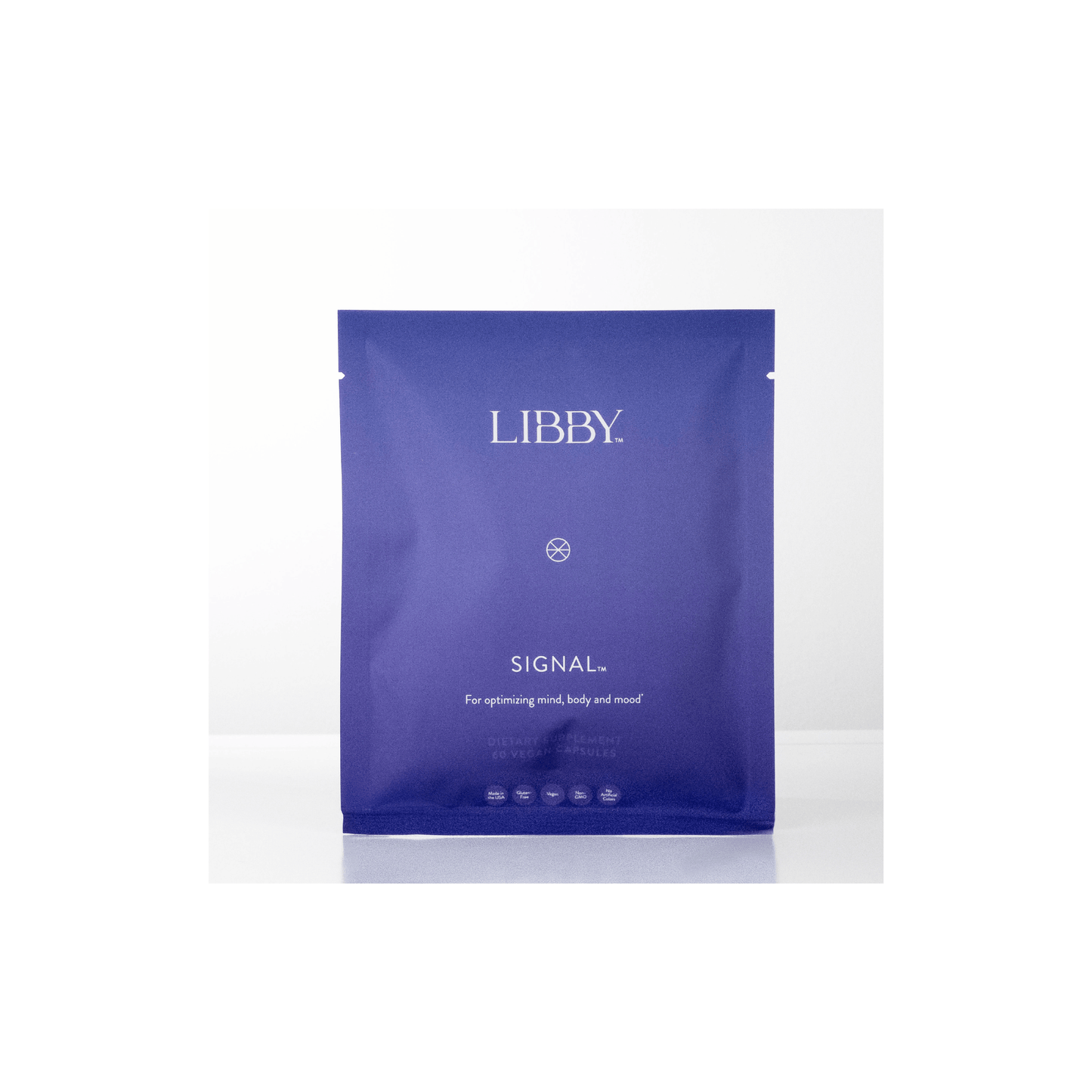 Front view of The Libby System Signal 60 capsules pouch highlighting the patented daily wellness formula for mind body and mood
