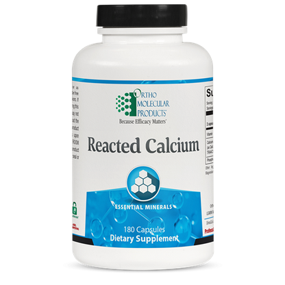 Reacted Calcium supplement bottle by Ortho Molecular Products for daily mineral support