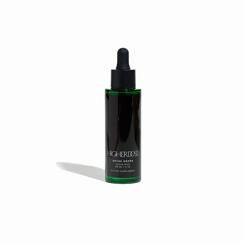 HigherDOSE Detox Drops dietary supplement in green and black dropper bottle for skin hydration and glow